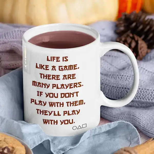 Squid Game Coffee Mug, Life is like a game, there are many players. If you dont play with them, theyll play with you Coffee Mug
